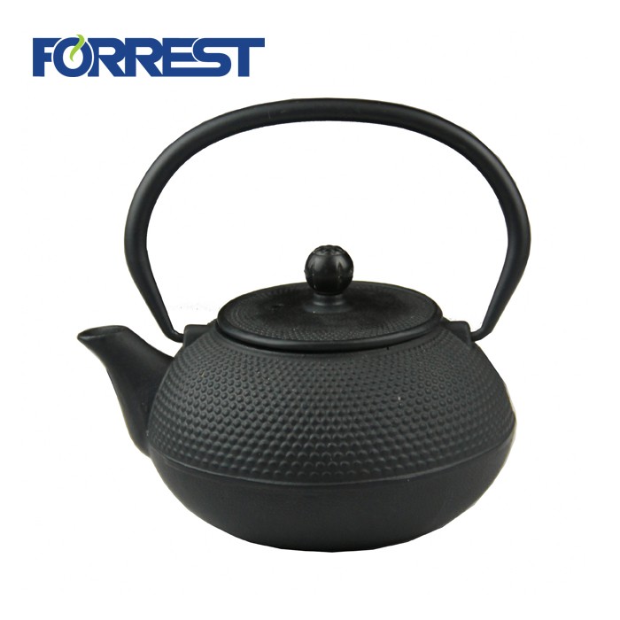 Cast iron green/orange tea kettle